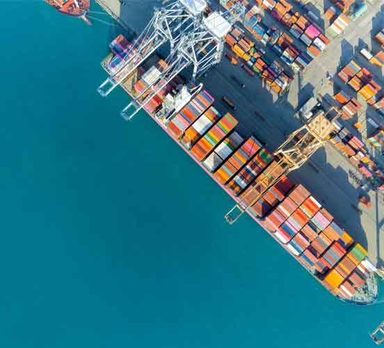 shipping container boat in a dock
